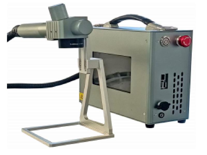 Holding a fiber laser marking machine.